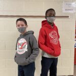 2 students modeling Moffet hoodies