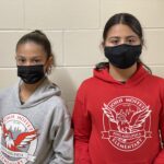 2 students modeling moffet hoodies 2