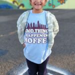 student wearing moffet attire