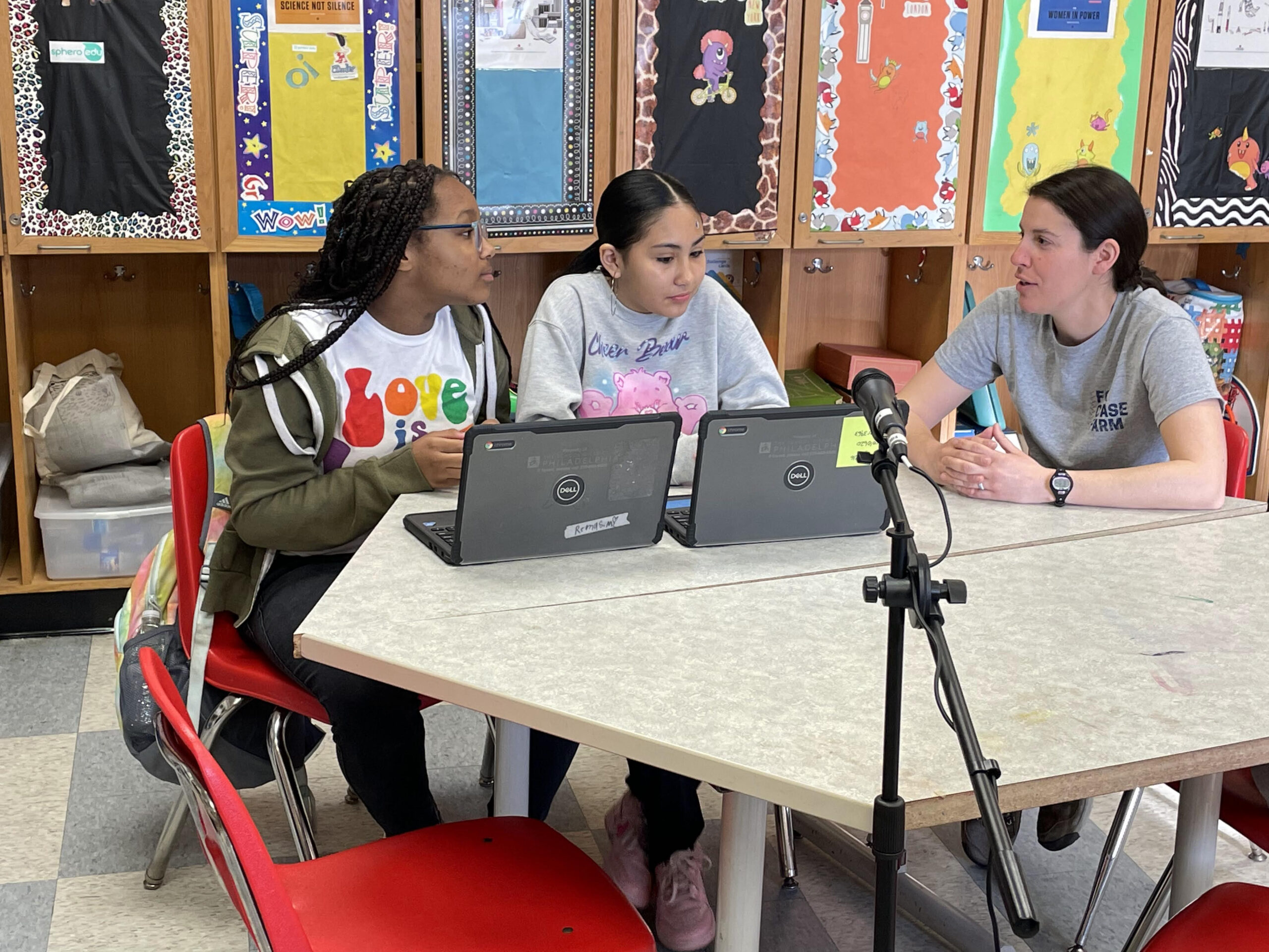 2 students interview a guest for the school Podcast