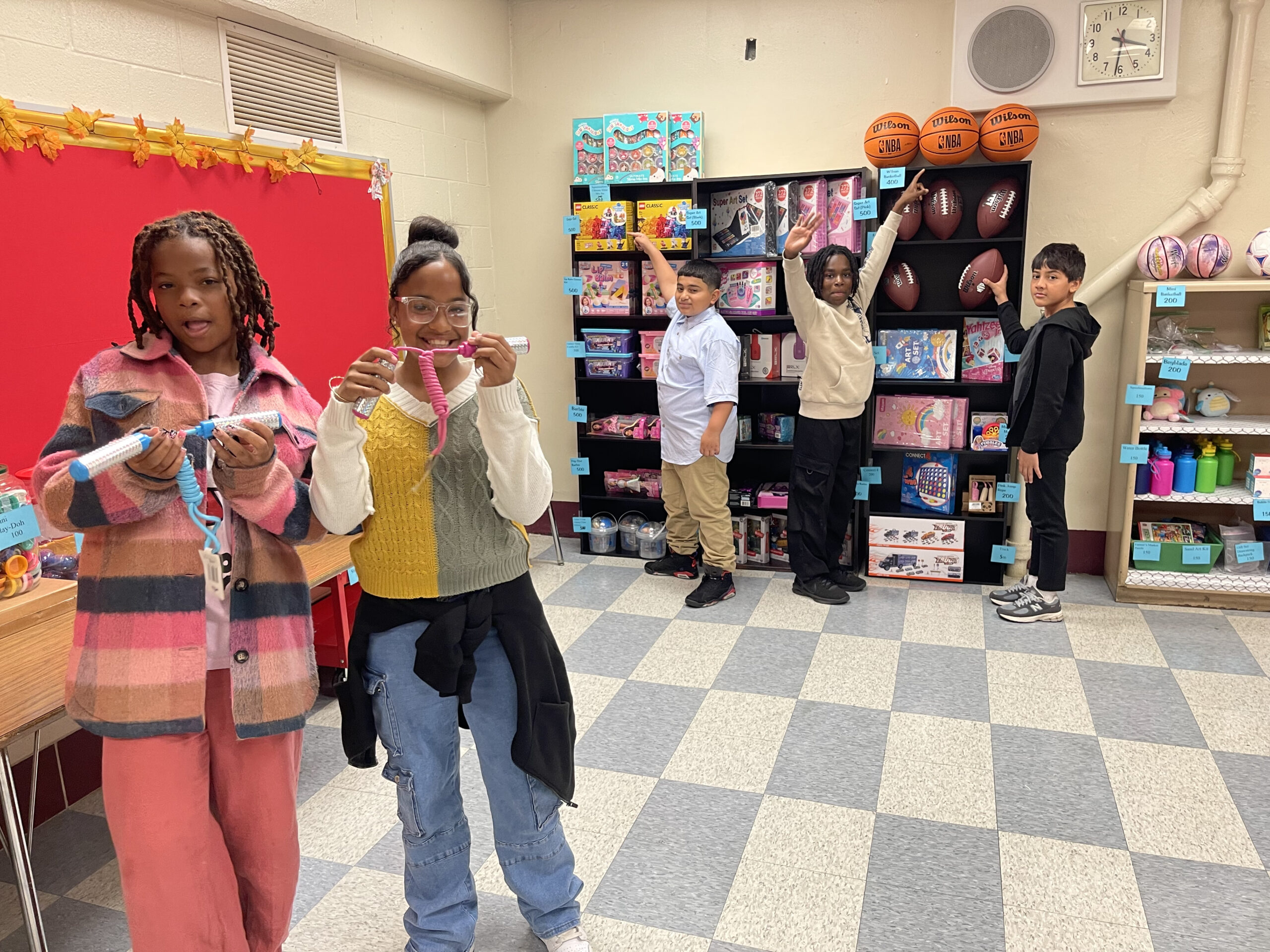 5 students shop in the PBIS Rewards Store