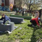 Our community members help set up new planting beds from Fox Chase Farm
